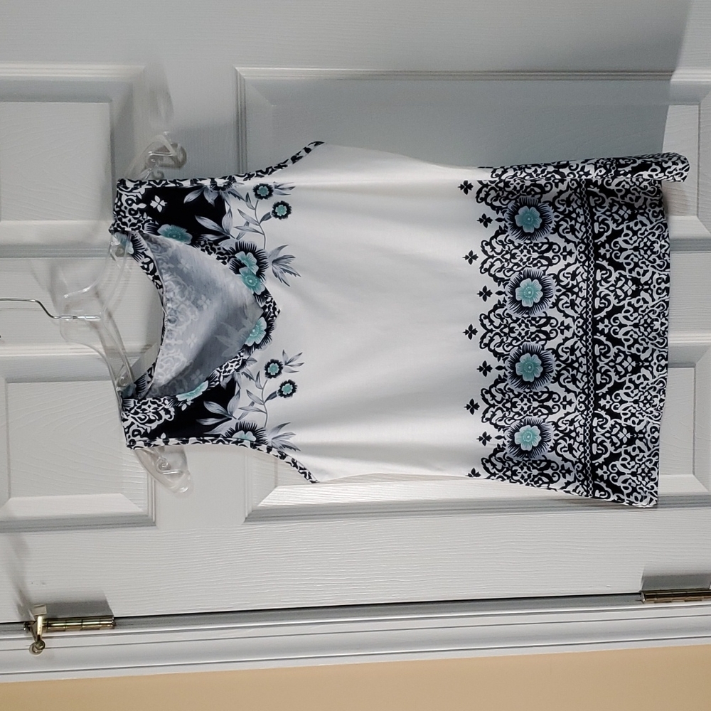 Tank top blouse with floral and scroll design in size Medium